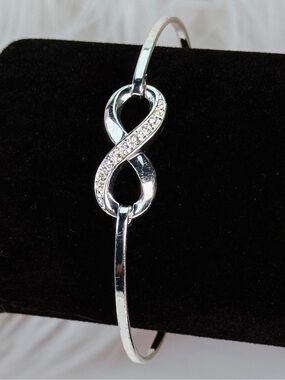 Silvertone bling accent Infinity Bracelet